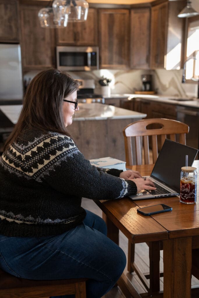 Becky Kuckkan Working at a kitchen table