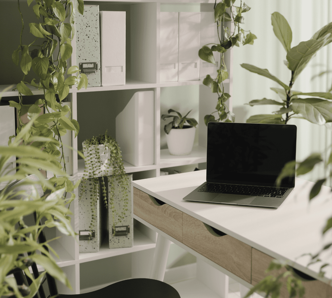 Laptop in office representing business tools for wellness entrepreneurs